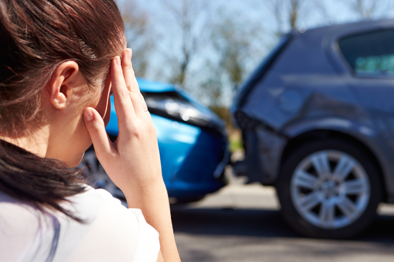 Car accident victim in distress after a collision — Dean & Camper P.A. personal injury attorneys
