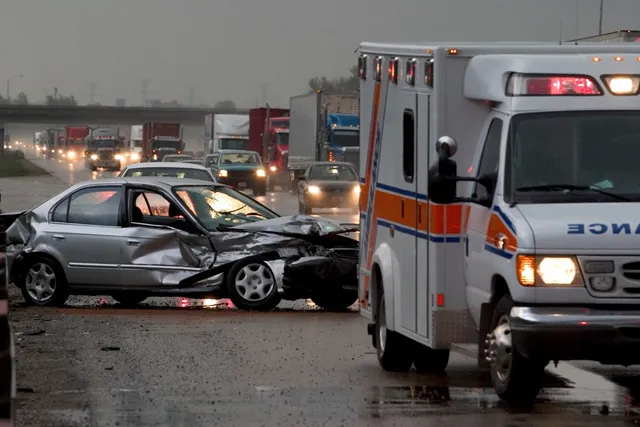 Car accident scene with ambulance responding